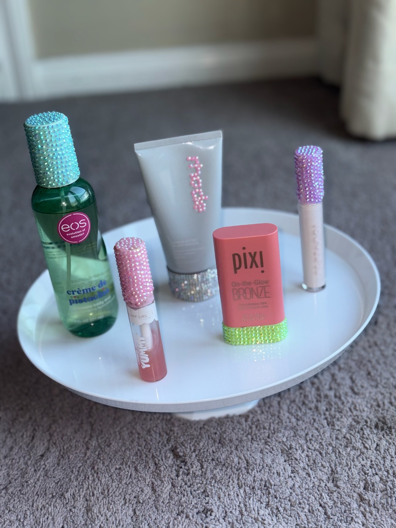 A collection of bedazzled beauty products by Stel